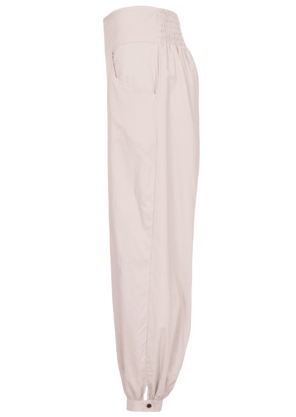 Side view of relaxed fit white cotton pants with pockets, elastic waist and buttoned ankles