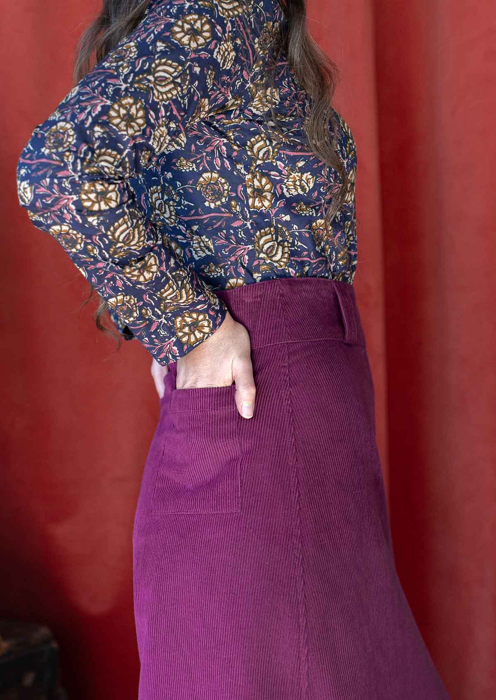 close up of pocket detail for purple corduroy skirt