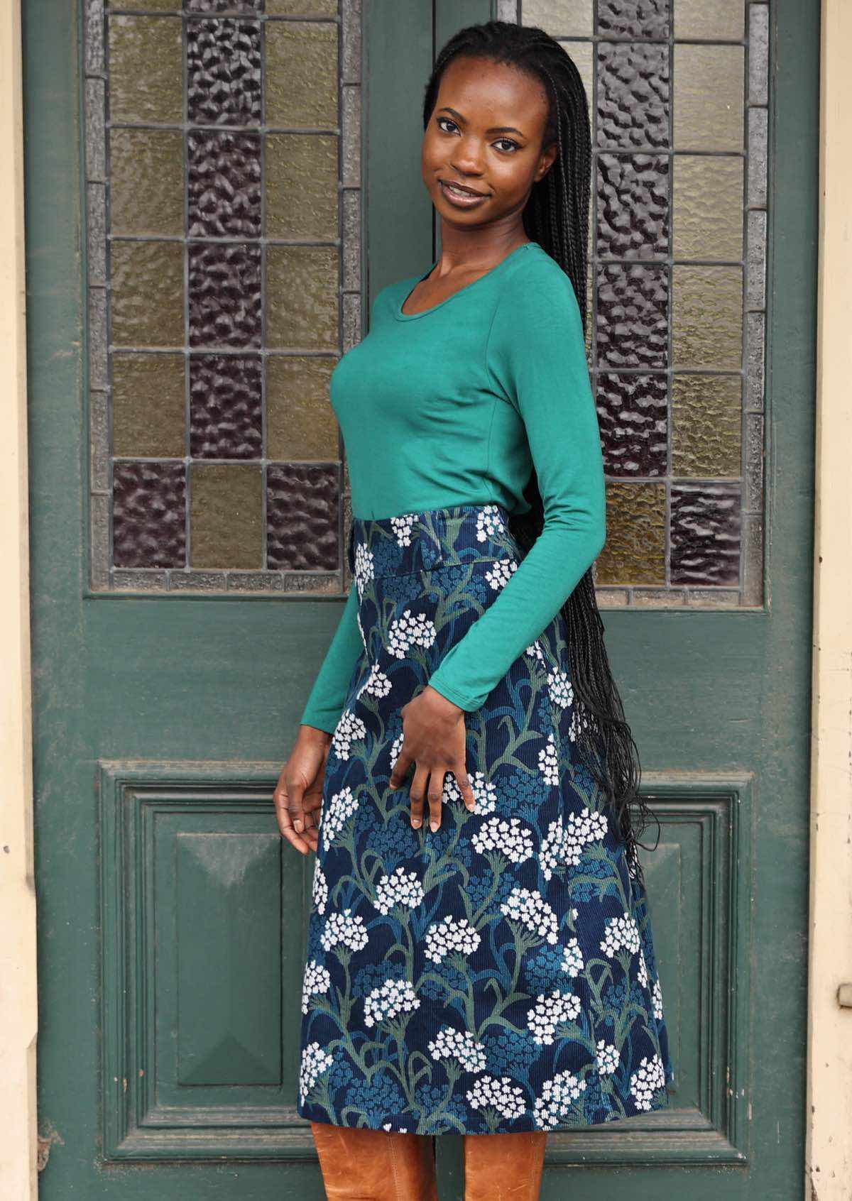 Shin length corduroy skirt with side zip and back pockets