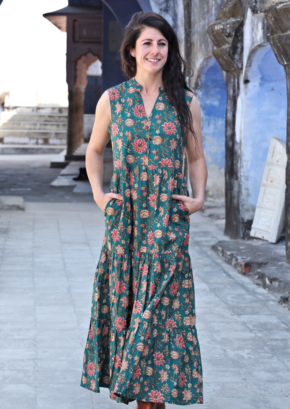 100% cotton maxi dress with pockets and buttoned bodice in beautiful burgundy floral print on dark green base.