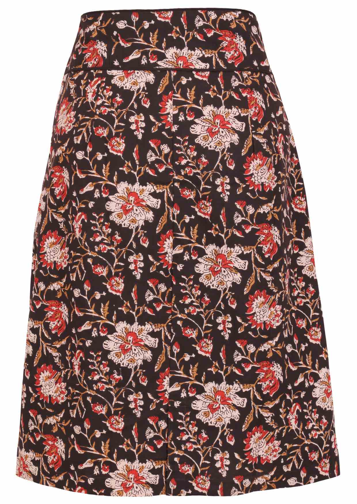 Back view of cotton pencil skirt with piped details around the waistband and small split at middle bottom hem