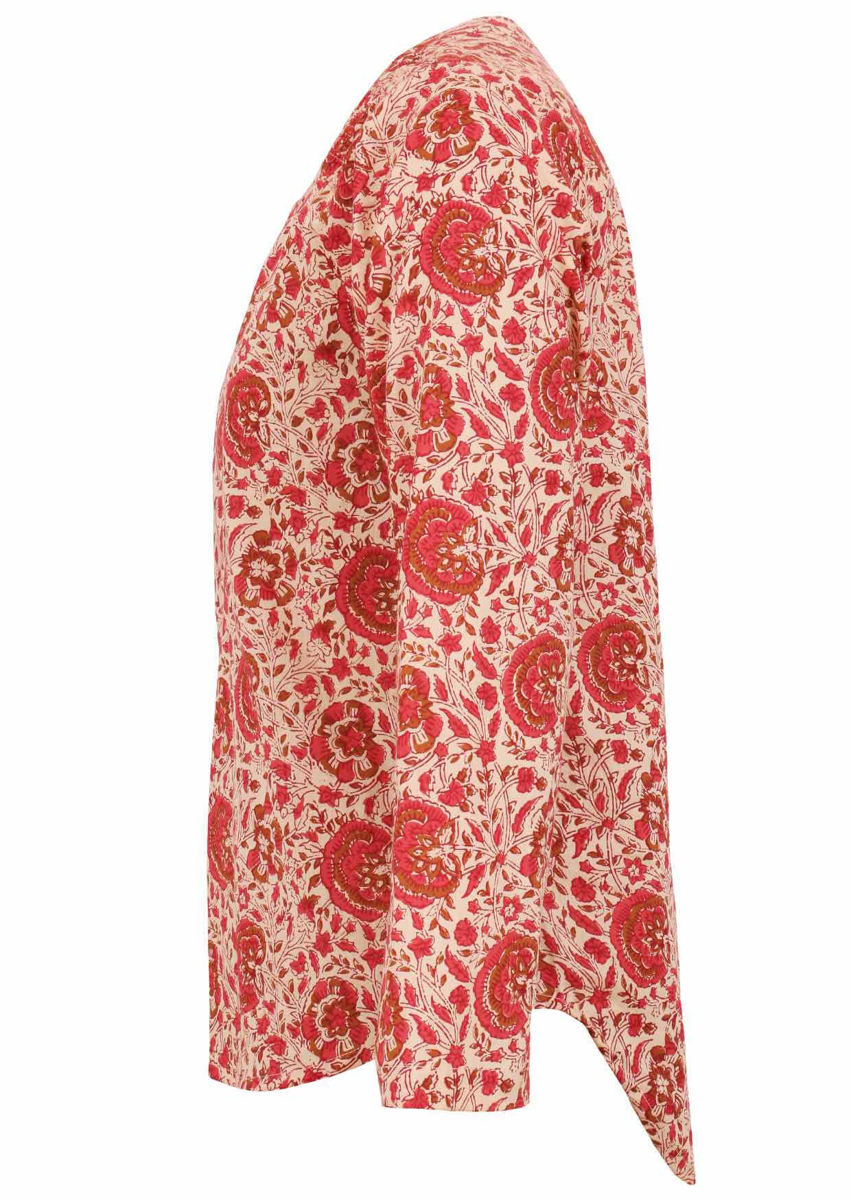 Long sleeve cotton top that is longer at the back with cream based floral print