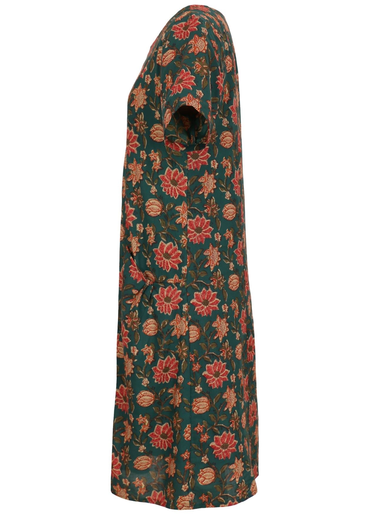 Side image of floral printed green cotton dress with short sleeves and pockets.