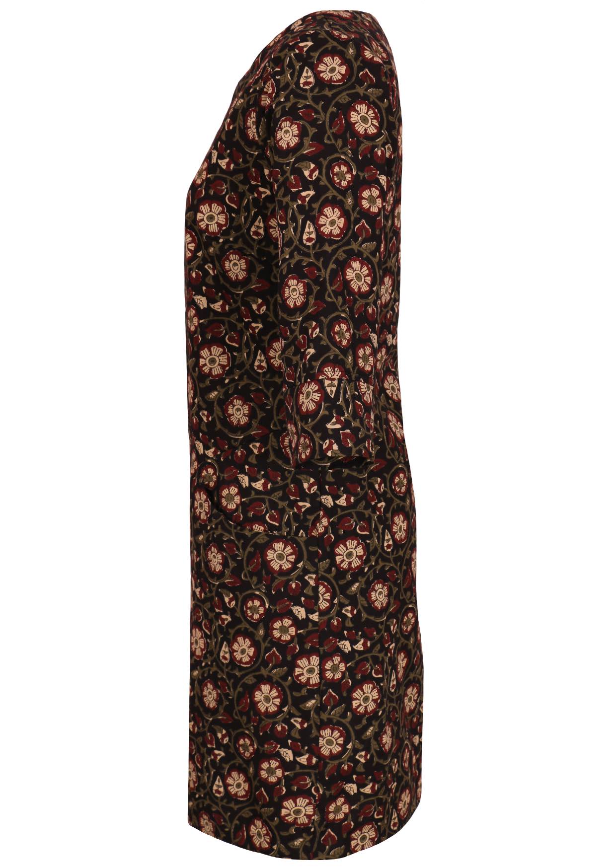 Side view of jamie dress in beautiful Sahira print with maroon, cream and olive floral designs on black base.