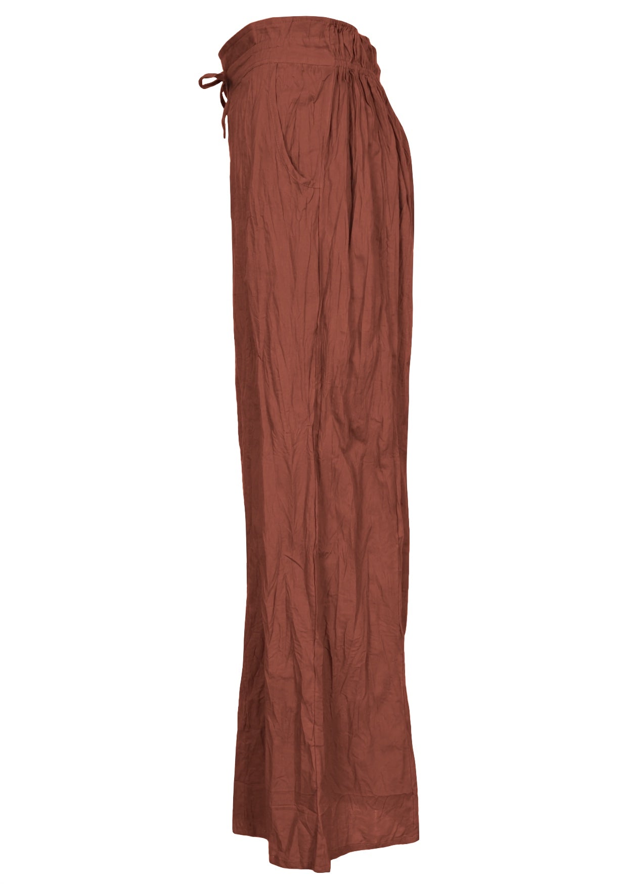 Side view of lightweight wide leg cotton pants in rust shade with drawstring waist tie and elastic back waist