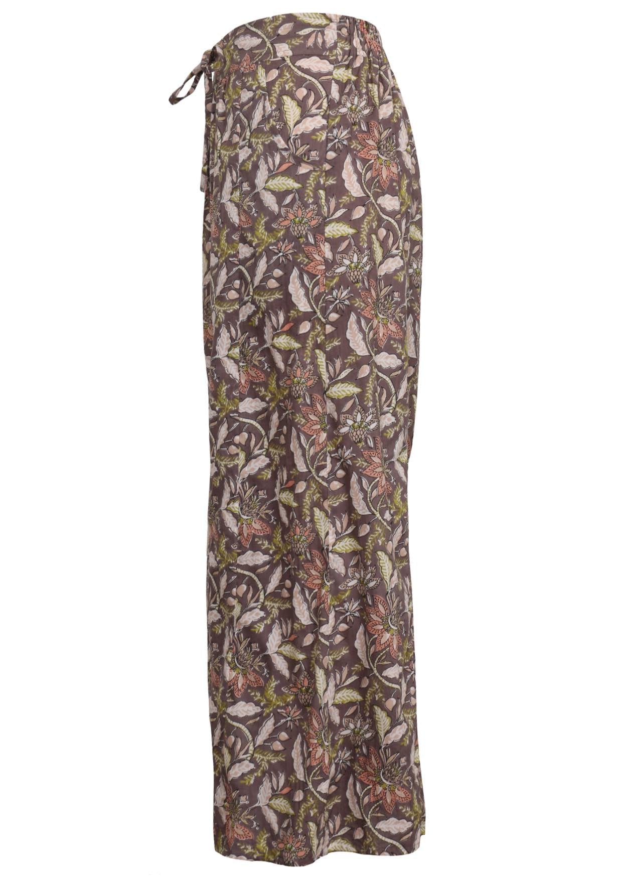 Side view of 100% cotton wide leg crinkled pants in light brown with drawstring and pockets