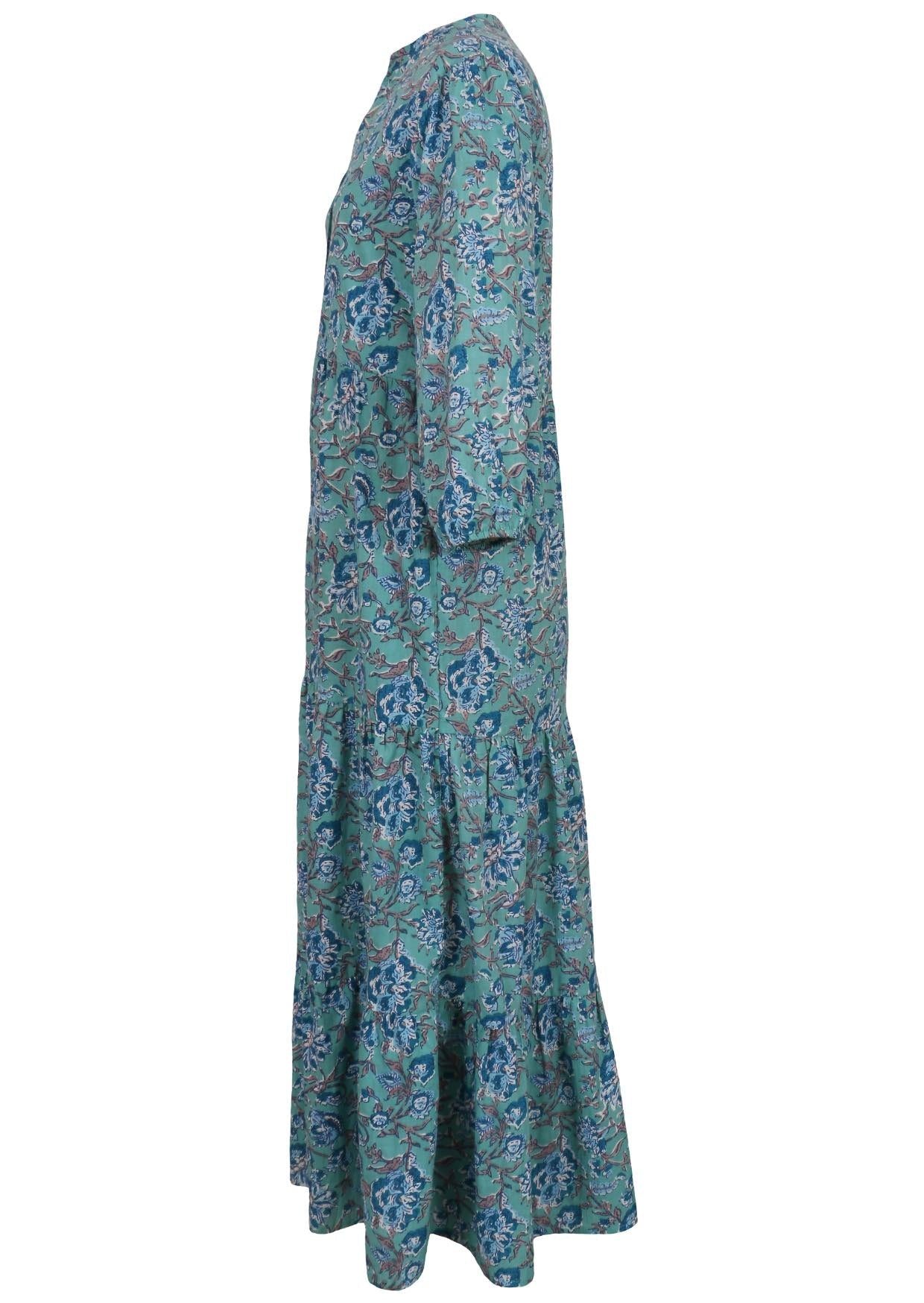 Side view of floral printed cotton maxi dress with 3/4 sleeves and pockets.