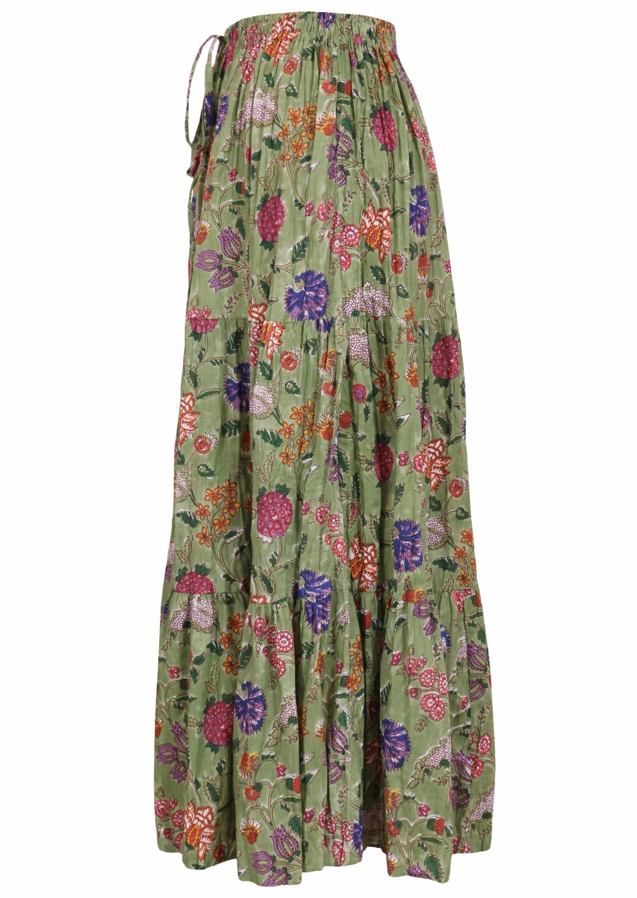 Green based multi-coloured floral print cotton skirt on a white background.