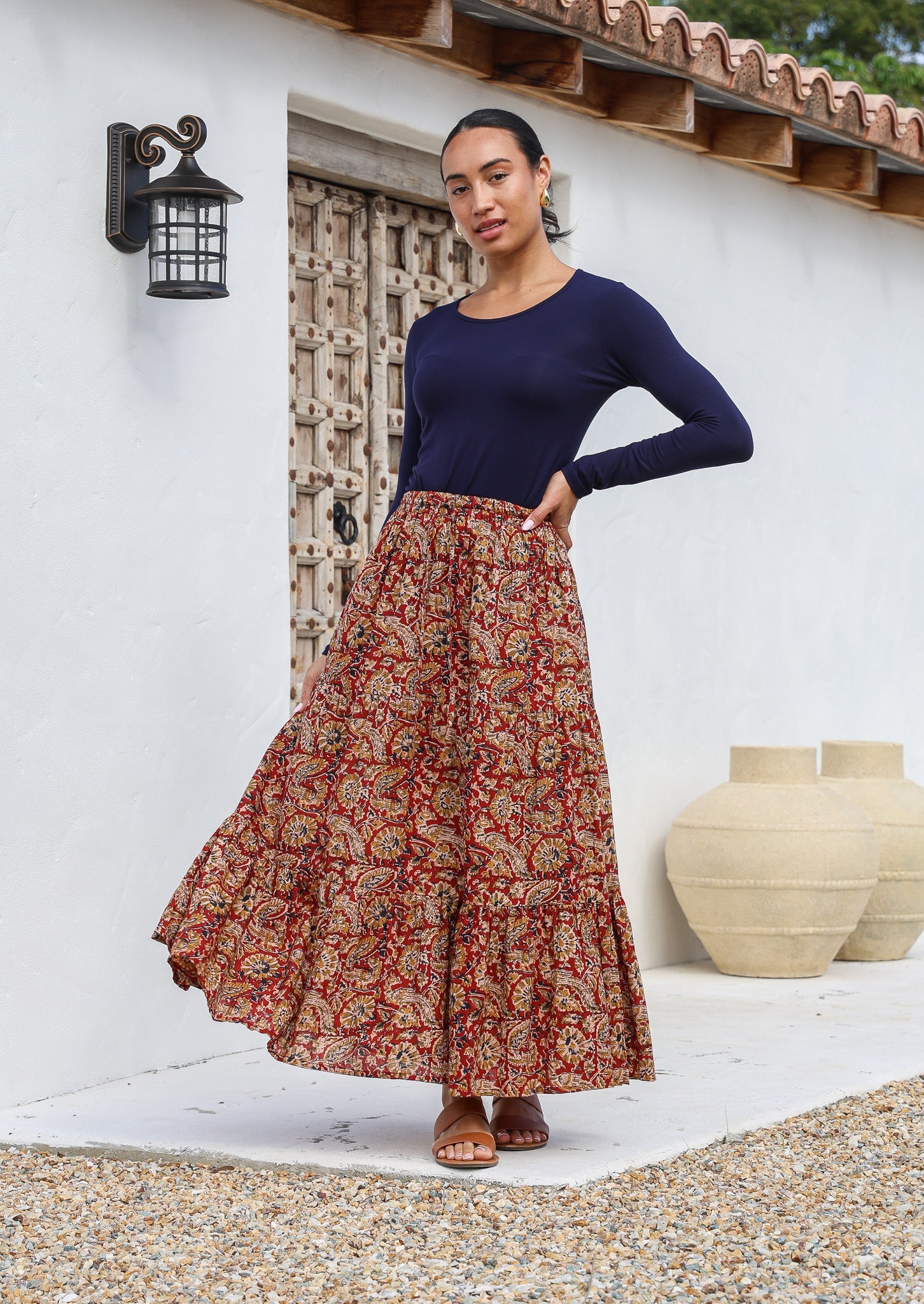 Model wearing 100% cotton maxi skirt with elasticised waist and drawstring in Indian floral print.