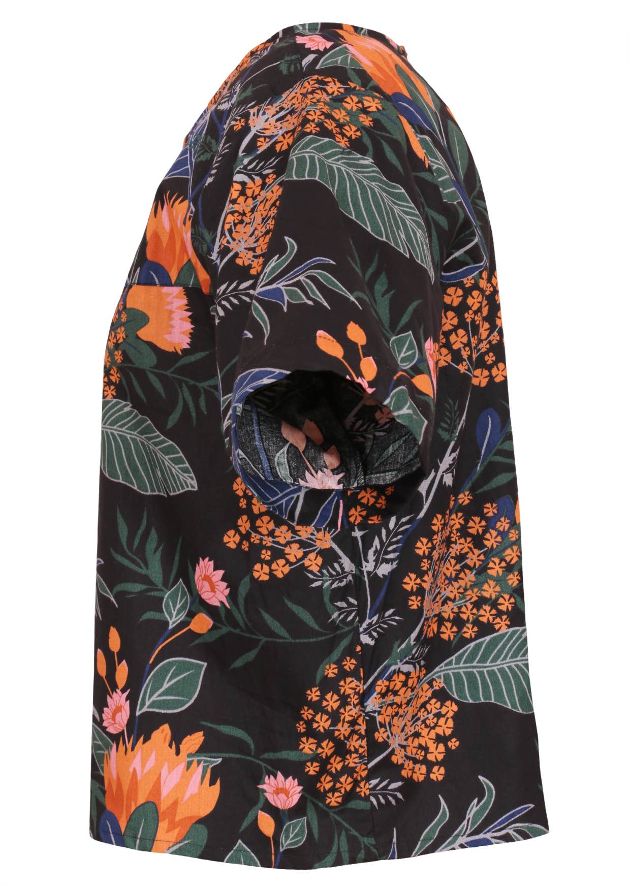 Side view of cotton loose fit boxy top with short sleeves in black based gorgeous protea print