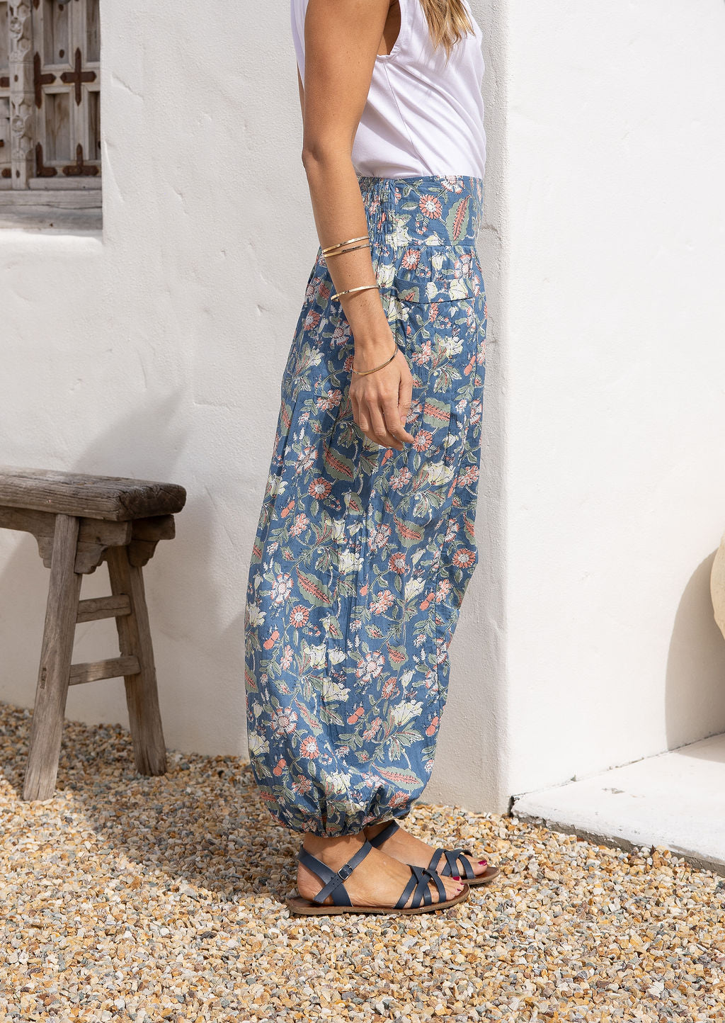100% cotton floral blue harem pants with flat wide waistband in front and elastic at the back.