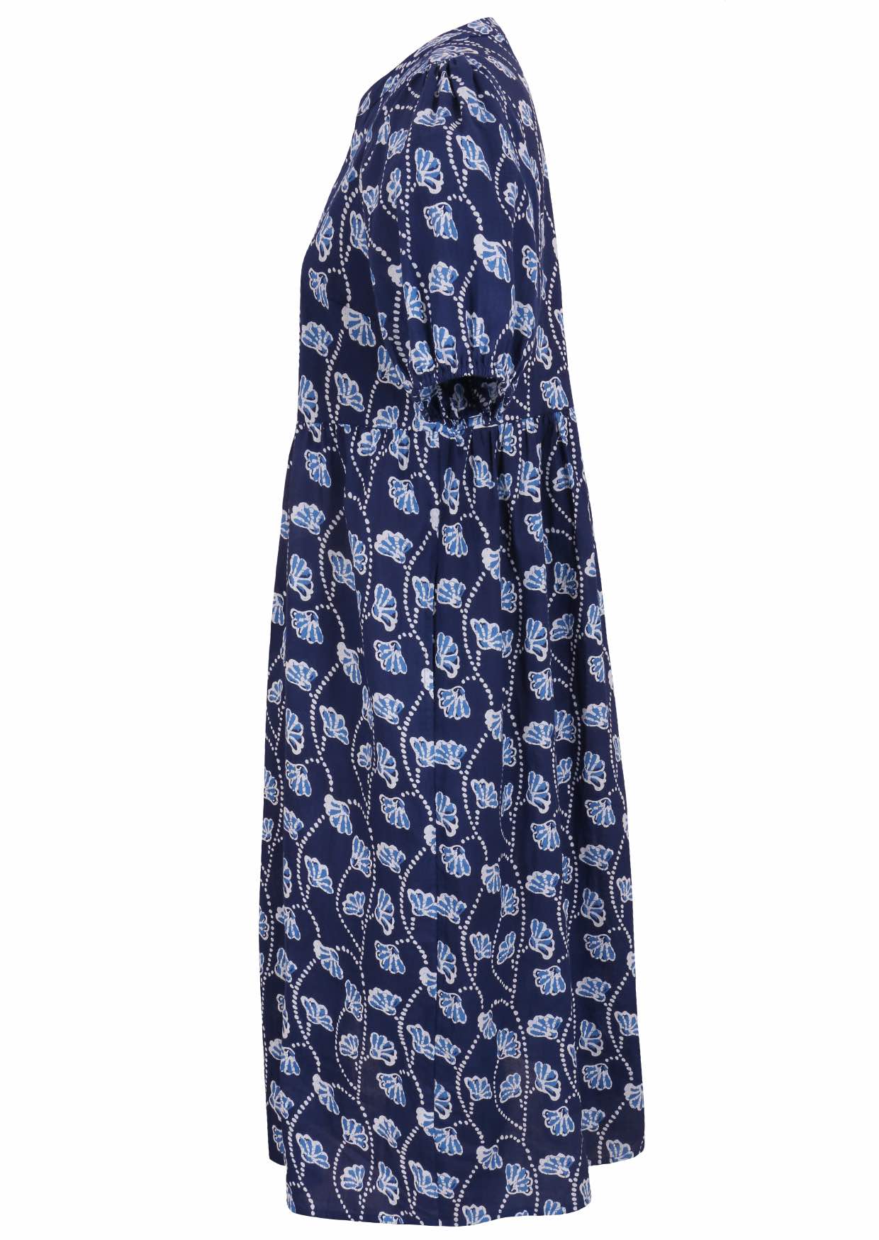 Side view of navy blue floral printed cotton midi length button through dress with hidden side pockets.