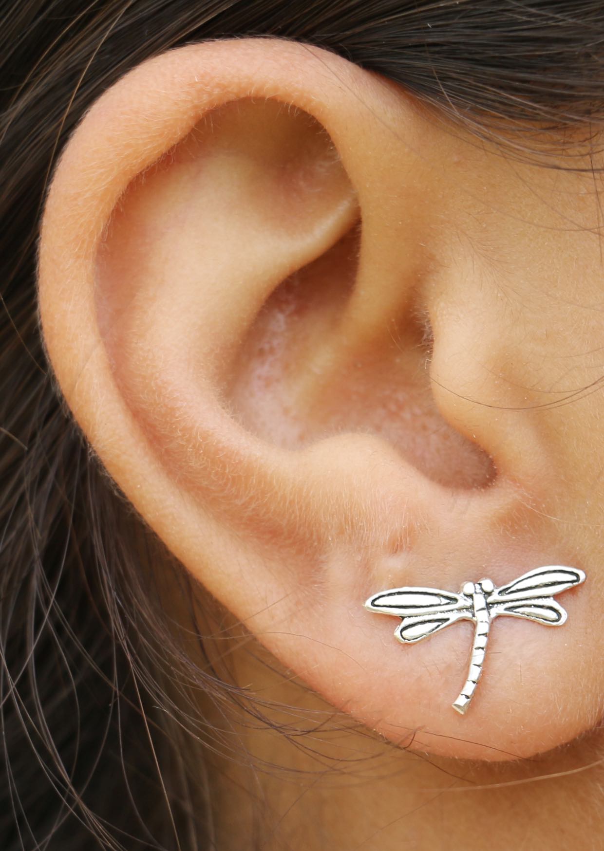 Large dragonfly silver studs with intricate details and butterfly backs
