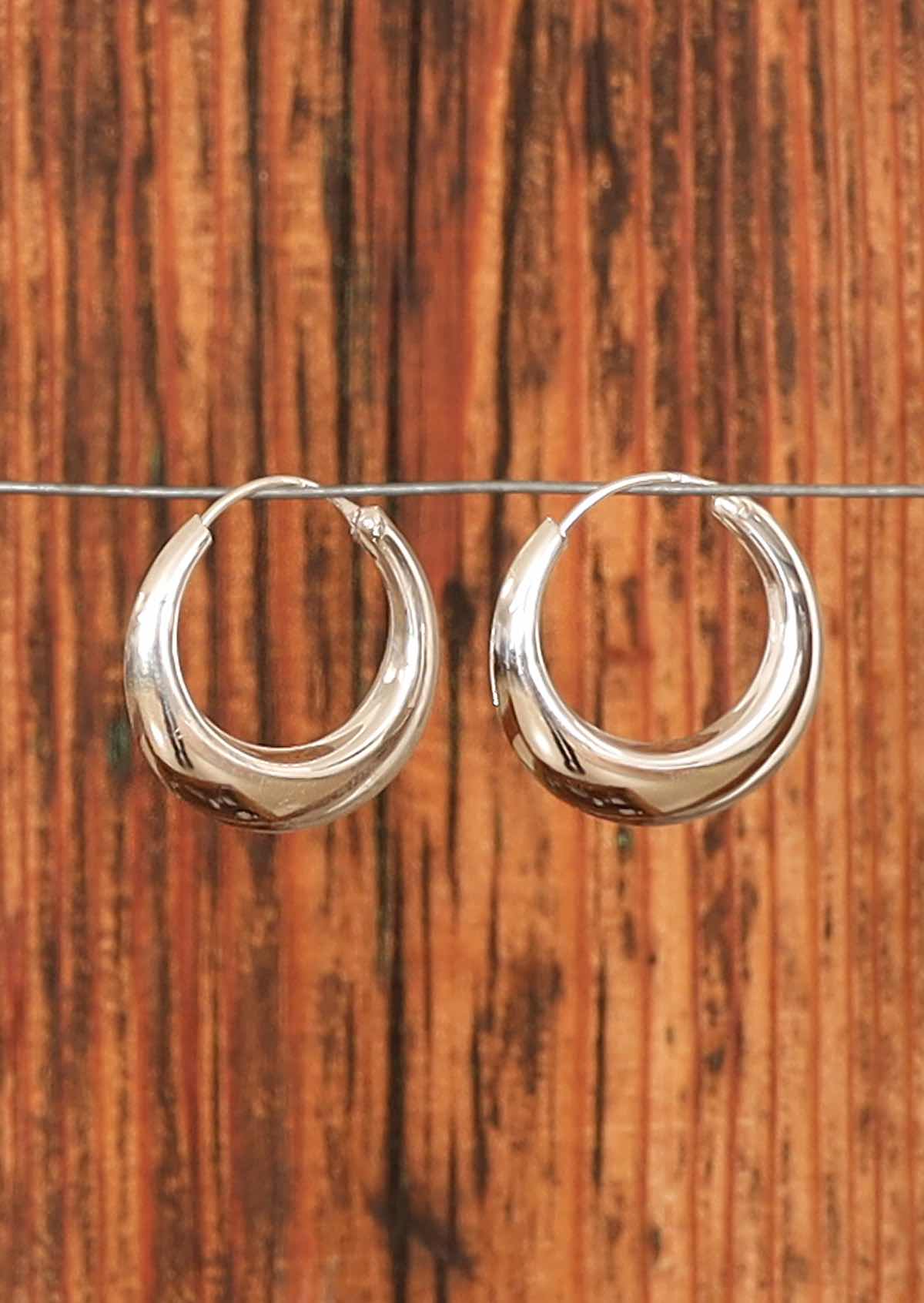 Thick silver hoop earrings