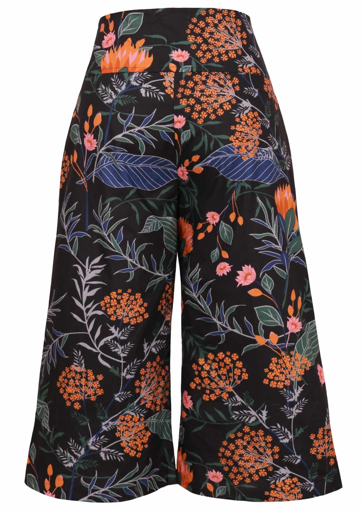 Back view of cotton wide leg printed pants in 3/4 length with pockets and side zipper