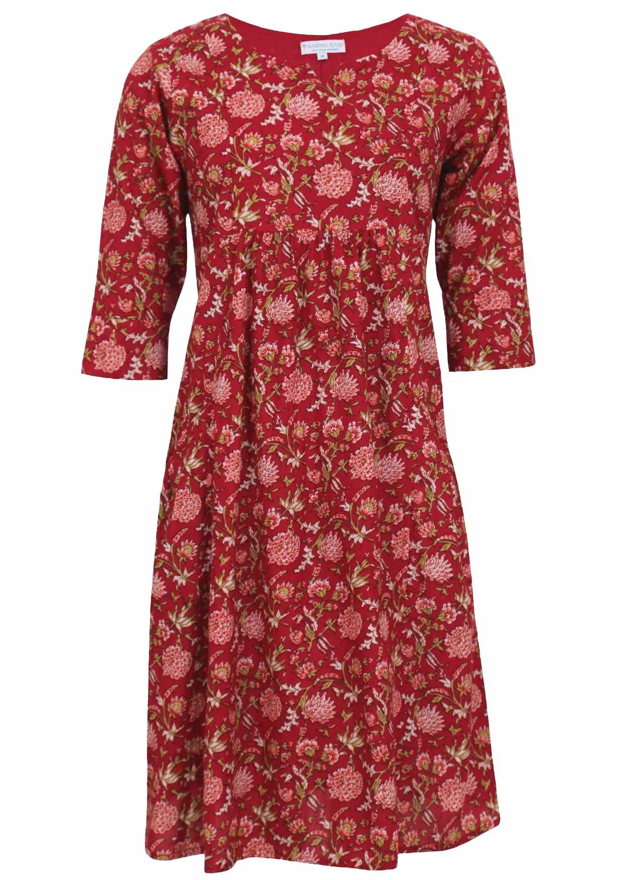 100% cotton knee length dress with round neckline, 3/4 sleeves and pockets.