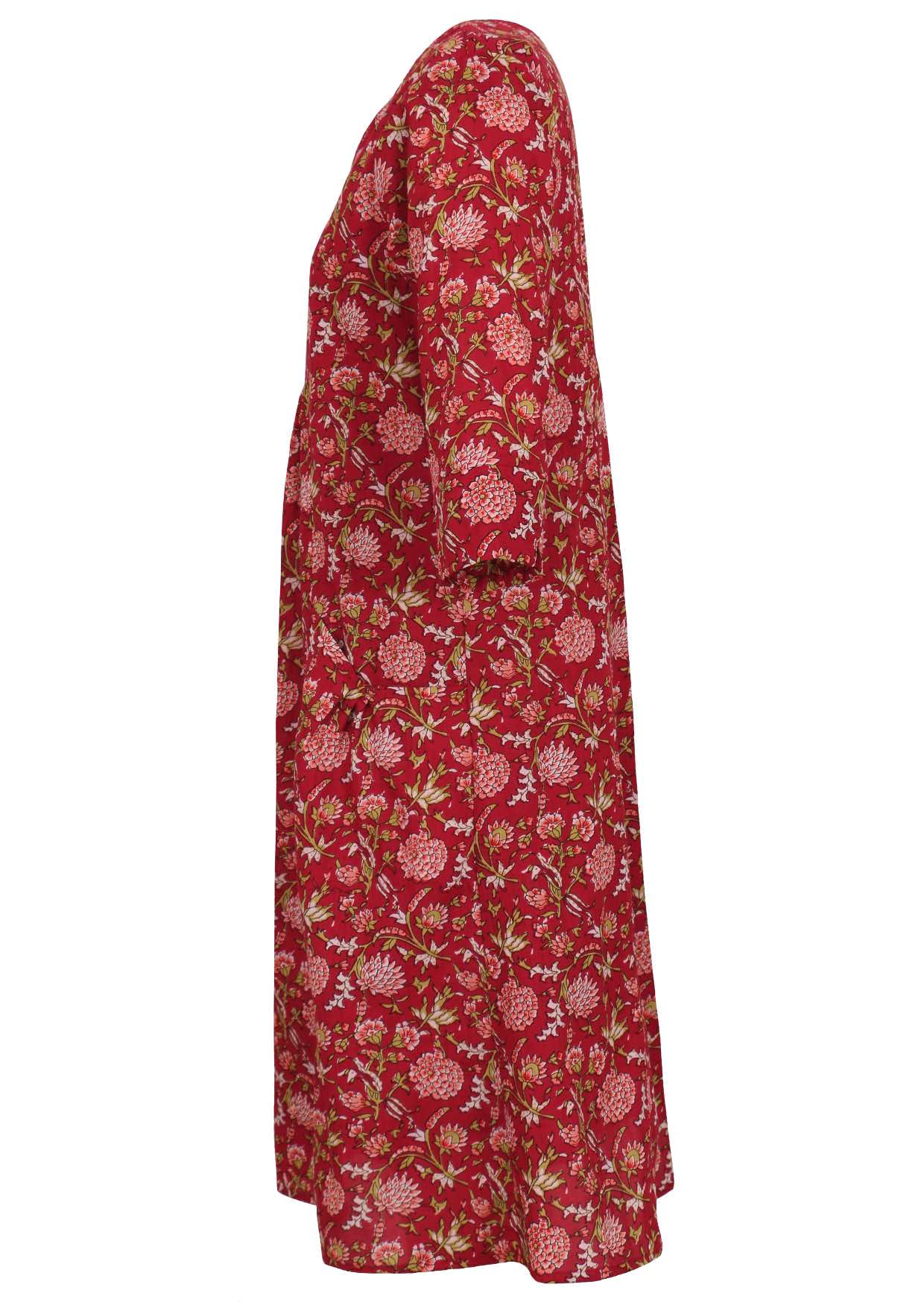 Side image of 100% cotton red dress with floral prints in pink, white and green colours.