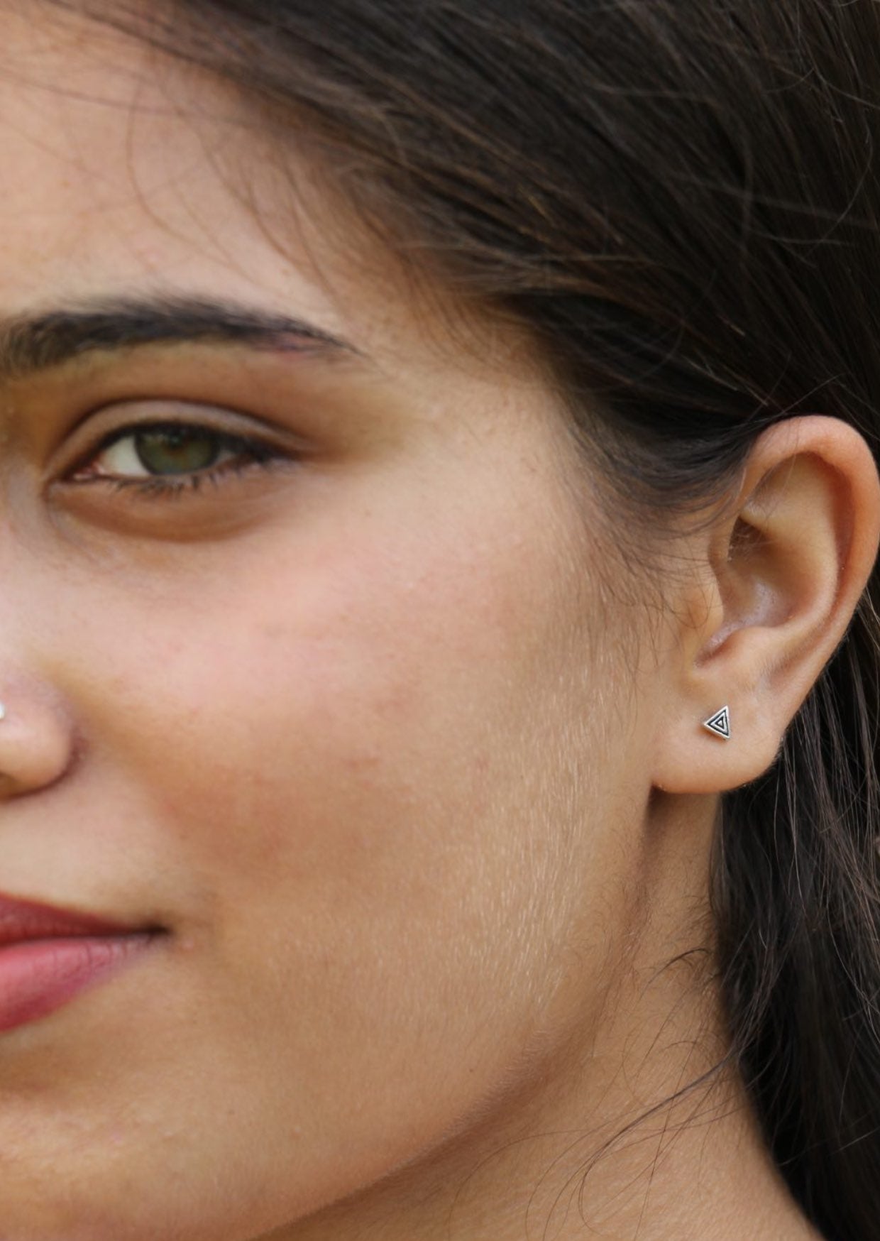 Sterling silver triangular shaped Triple Ripple studs with polished finish and butterfly backs