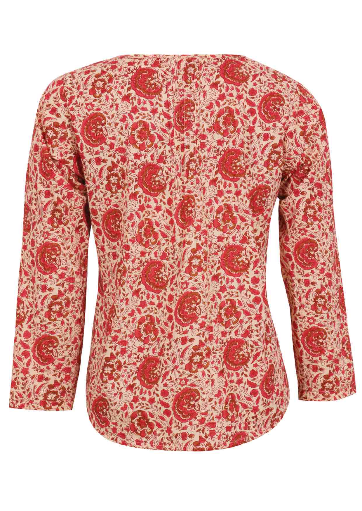 Back image of long sleeve cotton top with cream based floral print.