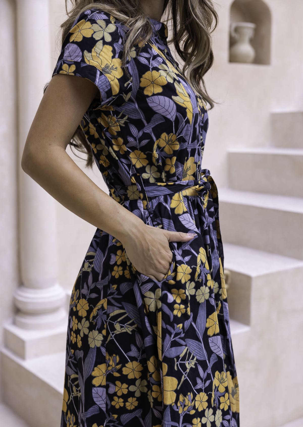 100% cotton retro floral dress with fabric tie and pockets.