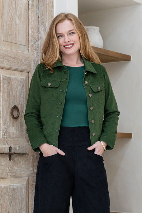 woman wearing a 100% cotton corduroy jacket with breast and front pockets