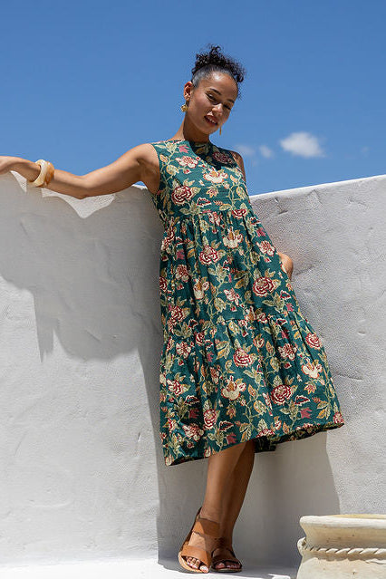 Green cotton floral dress on woman