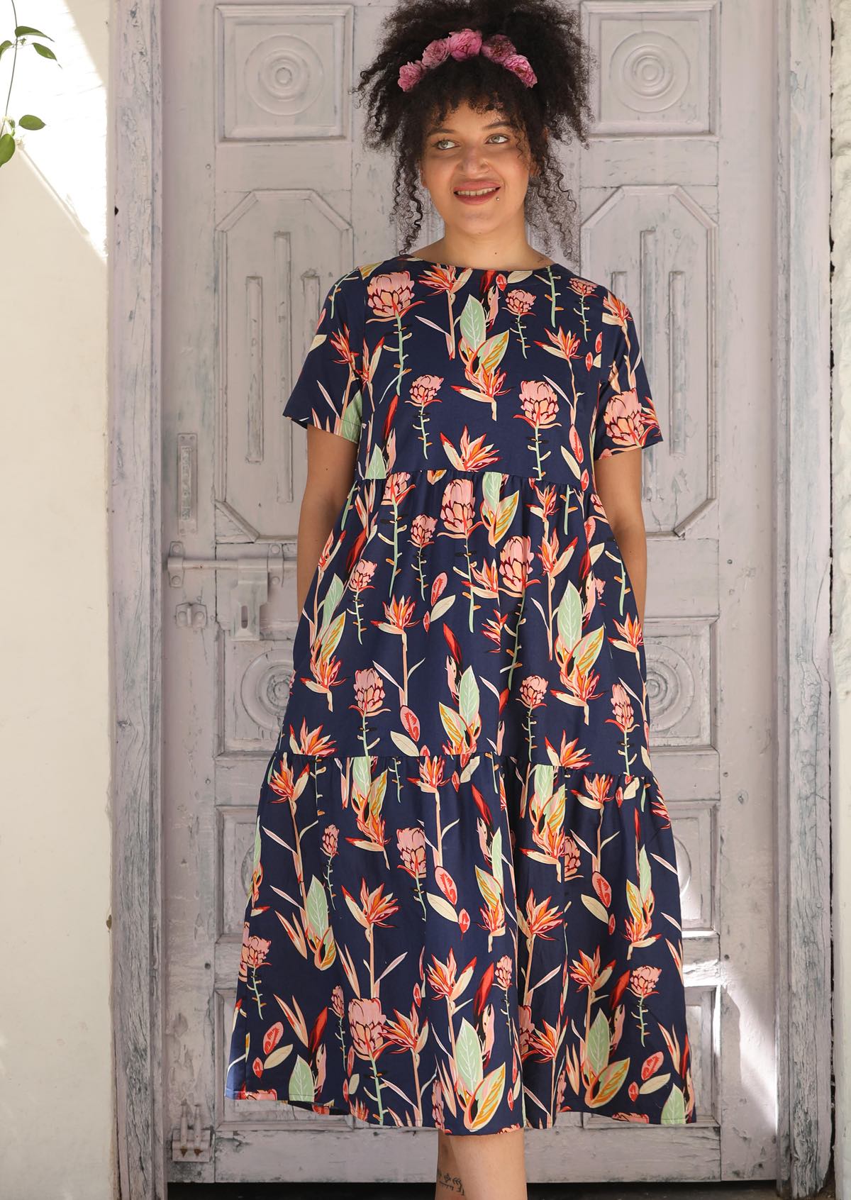 100% Cotton navy blue Midi Dress with short sleeves, high round neckline and pockets.