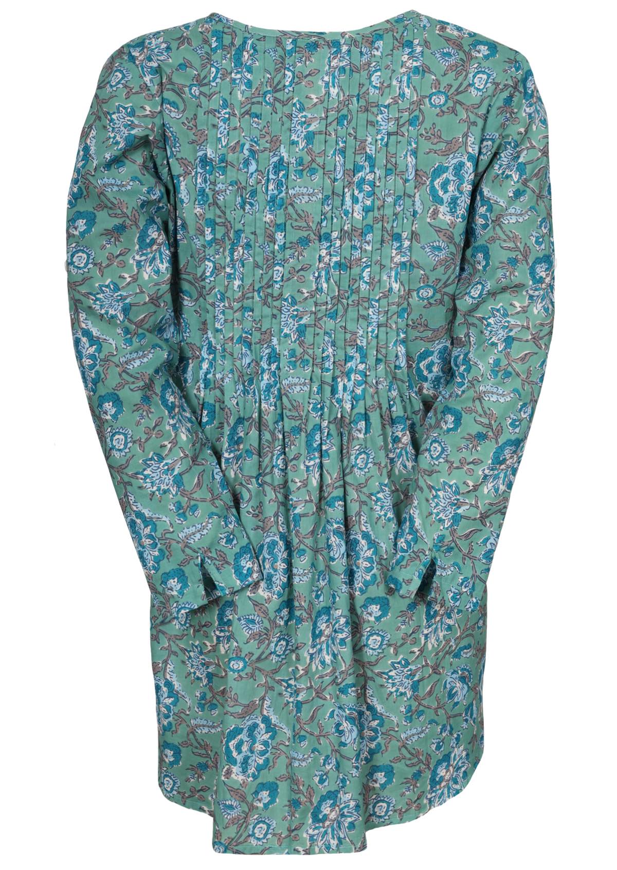 Long sleeve cotton floral top with pin tucks in centre back and a designer cut in the sleeves.