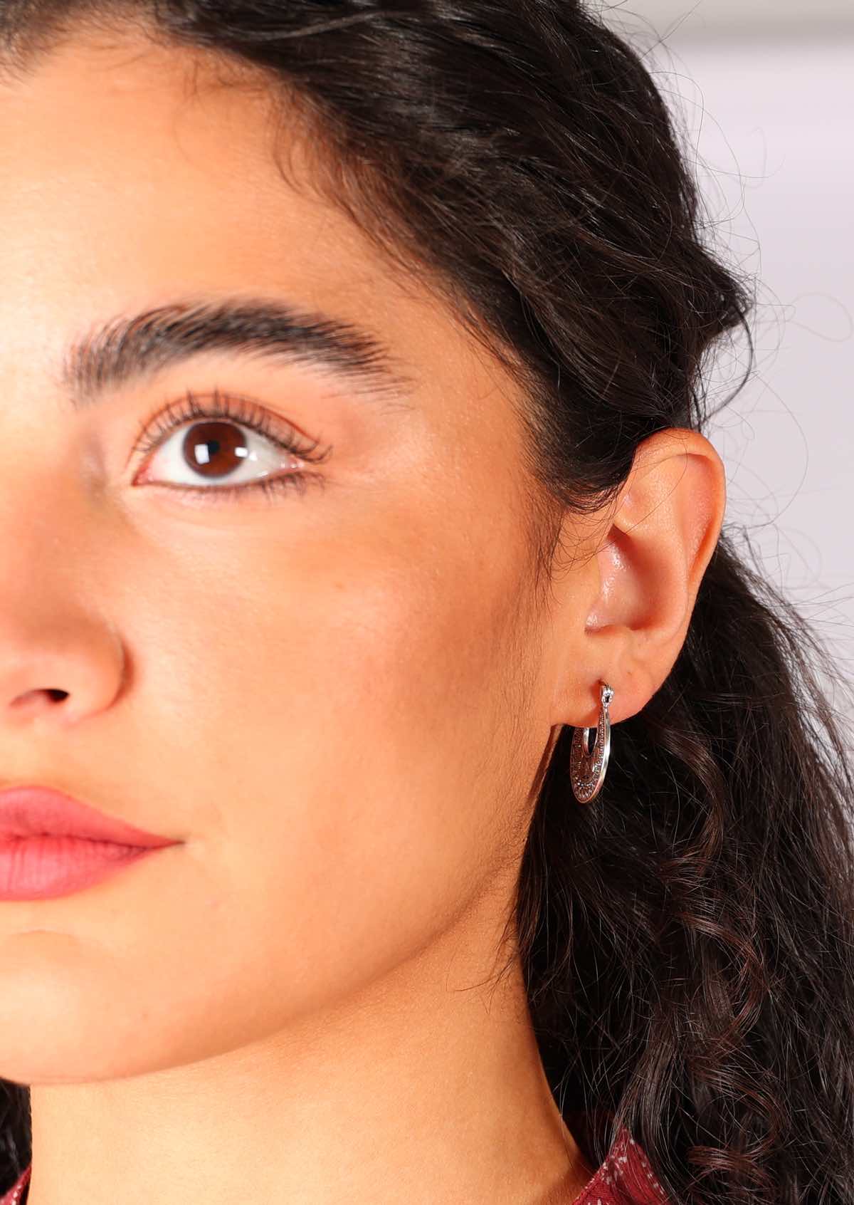 Close up showing the 1mm thickness of these gorgeous silver earrings