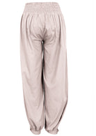 White cotton harem pants with cuffed ankles, pockets and shirring at back of the waist 