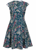 V-neck cotton dress with delicate multicoloured wildflowers on a teal base.