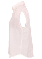 Side image of relaxed fit shirt style cotton top in white with short sleeves and a collar
