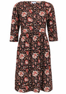 Black based, knee length cotton dress with wide round neckline and 3/4 sleeves.