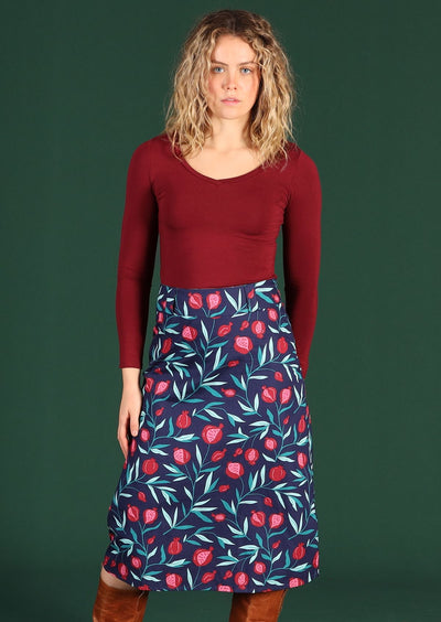 Women wears pomegranate shin length skirt with hidden side zip