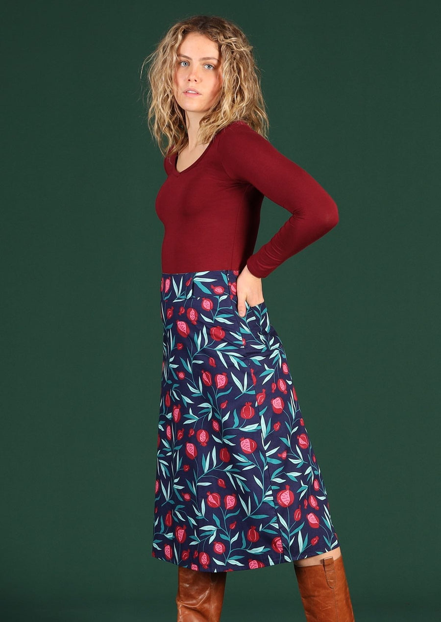 Model wears 100% cotton skirt with belt loops