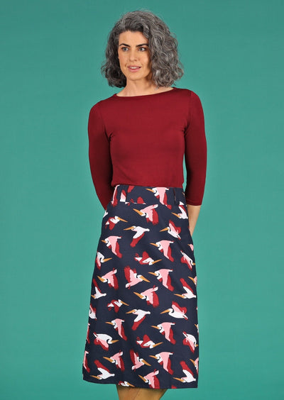 Belt Loop Skirt Percival bird print on dark blue base 100% cotton mid length skirt with belt loops side zip and pockets | Karma East Australia