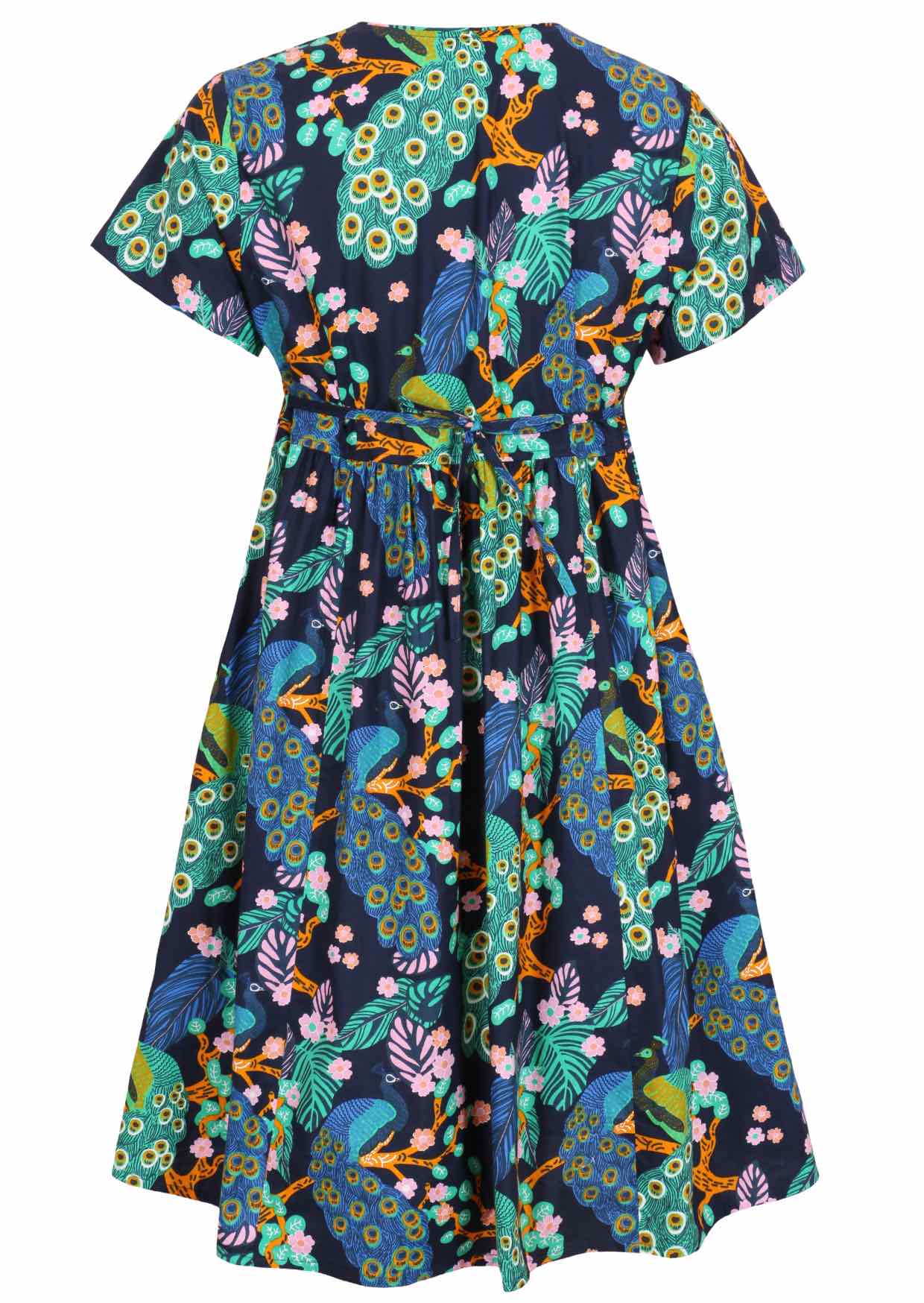 Back view of a navy blue based floral cotton button through dress with short sleeves and shoestring waist ties