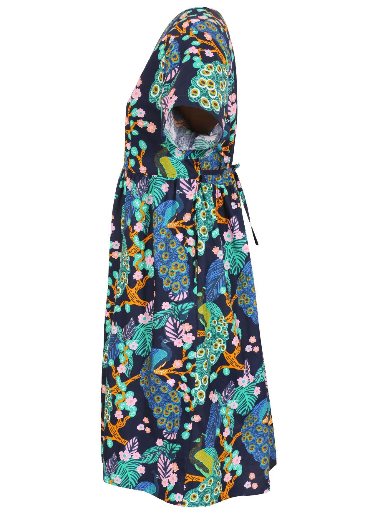 Side view of a navy blue based floral cotton button through dress with short sleeves