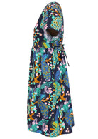 Side view of a navy blue based floral cotton button through dress with short sleeves
