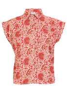 Cream based warm floral print cotton shirt on a mannequin against a white background