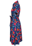 100% cotton shirt style maxi dress with removable fabric waist tie and side pockets in a royal blue based print