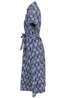 100% cotton shirt style maxi dress with removable fabric waist tie and side pockets in a navy blue based print