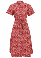 Warm-toned Japanese-style print cotton dress in pink, maroon, brown, peach, and khaki with pockets.