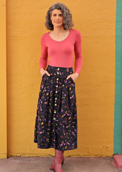 button through skirt with box pleats and pockets