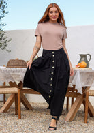 Woman wearing a basic t shirt with a high crew neckline paired with a skirt