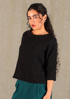 Black top made from two layers of lightweight cotton gauze