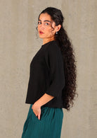 Double cotton top in basic black looks great over jeans