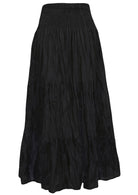 Back view of lightweight cotton three tiered maxi skirt with wide shirred waistband