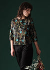 Model wears 100% cotton top with 3/4 sleeves