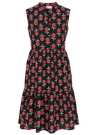 100% cotton sleeveless black based floral print dress with buttoned bodice, mandarin collar and two tiered skirt 